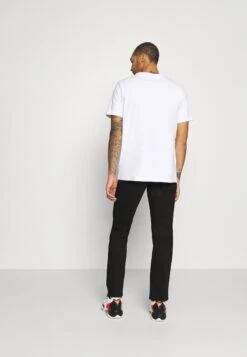 Wrangler TexasJeans Slim FitBlack Valley Uomo Jeans WR122G08E-Q11 -Wrangler b33abee3d489487696c6172a4f3a6f37